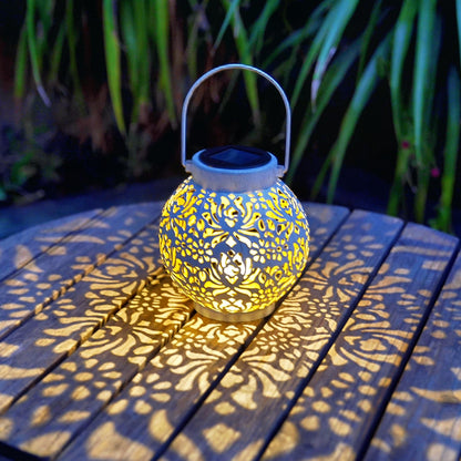 2-Pack Outdoor Solar Hanging Lanterns - Metal LED Decorative Lights for Garden, Patio, Courtyard, Lawn, and Tabletop with Hollowed-Out Design in White.