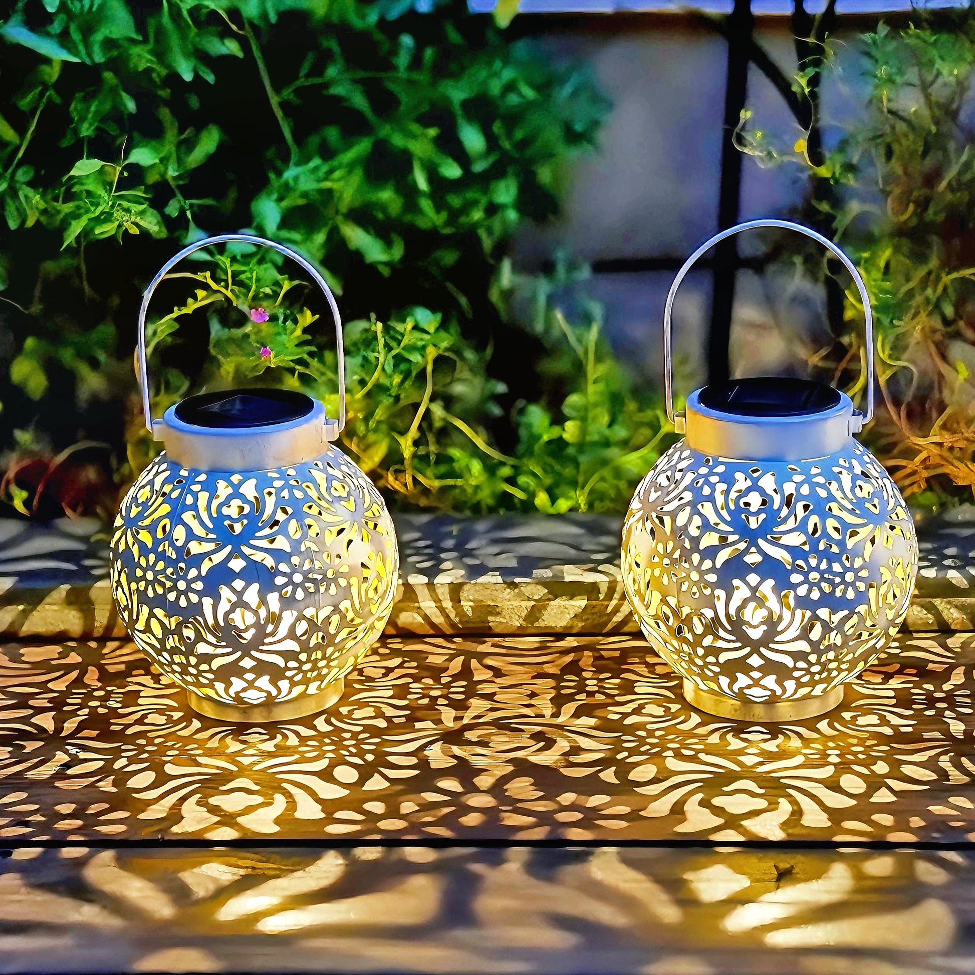 2-Pack Outdoor Solar Hanging Lanterns - Metal LED Decorative Lights for Garden, Patio, Courtyard, Lawn, and Tabletop with Hollowed-Out Design in White.